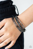 B355 A Piece of The Action - Black - Bracelet - Paparazzi