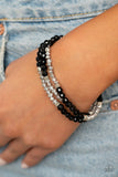 B300 How Does Your Garden Glow - Black -  Bracelet - Paparazzi